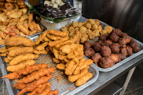 Indian breakfast traditional samosa dosa vadai brown balls deep fried.