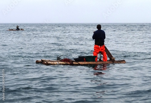 Squid fishing rafts (balsas) between Foca Island and Yacila, near Paita, Peru
