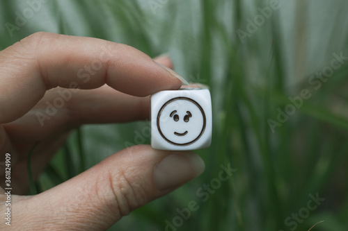 Uśmiech symbol na kostce