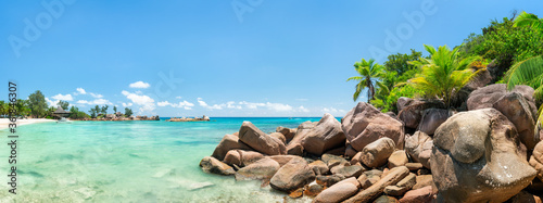 Tropical beach in the Seychelles as panorama background