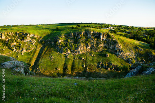 Trinca Nature Reserve in Republic of Moldova. Trinca village. Green landscape. Amazing Nature. Park with Green Grass and Trees. Grassy field and rolling hills. rural scenery. Europe nature.