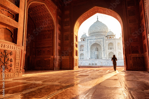 The magnificent Taj Mahal in India shows its full splendor at a glorious sunrise.