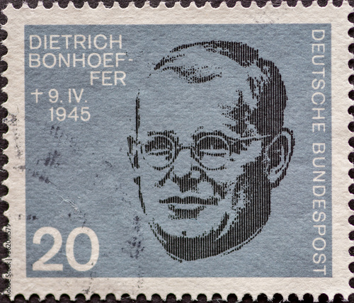 GERMANY - CIRCA 1964: a postage stamp showing a portrait of Dietrich Bonhoeffer who was a resistance fighter against Adolf Hitler. 20th anniversary in 1964