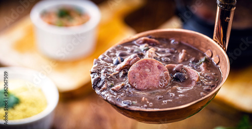 feijoada detail, shell of food served hot. Brazilian food.