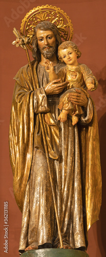 BARCELONA, SPAIN - MARCH 3, 2020: The carved polychrome statue of St. Joseph in the church Nuestra Senora del Sagrado Corazon from 19. cent.