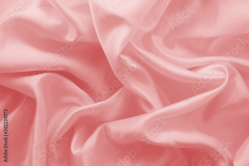 Background of silk pink fabric waves