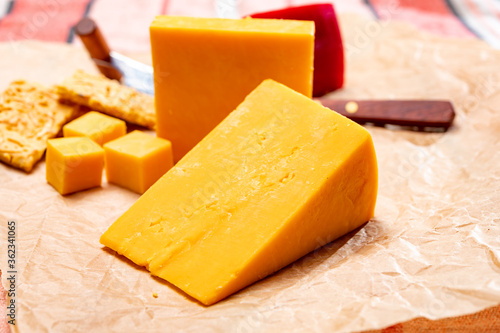 Matured yellow cheddar cheese close up