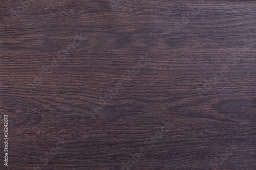 Wenge. Dark wood texture. Background for design.