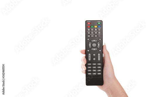 Woman hand holding TV remote control isolated