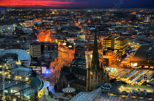 St. Martin's in the bullring with sunrise over the digbeth district of Birmingham UK, shot from the rotunda landmark building