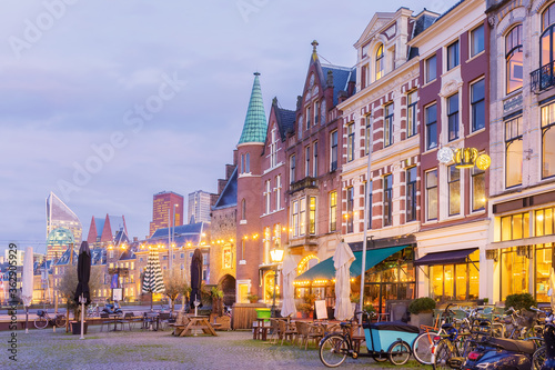 Central historic square Plaats with bars and restaurants with government and office buildings in the back in the ancient city center of The Hague