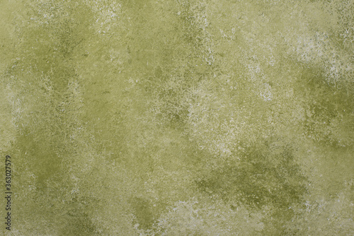 Concrete background in olive or khaki color