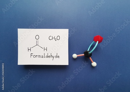 Molecular structure model and structural chemical formula of formaldehyde molecule. Formaldehyde (methanal) is an organic compound; it is the simplest of the aldehydes. Black=C, white=H, red=O.