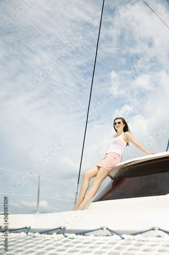 Woman posing on a yacht