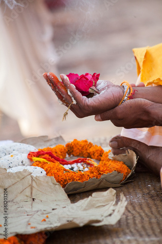 flowers is stable on hand at varanasi ghat.