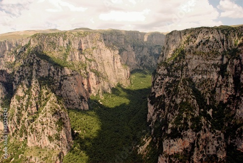 Panoramic view of the Vikos gorge from the viewpoint Oxya of Monodendri village, one of the 45 villages known as Zagoria or Zagorochoria in Epirus region of southwestern Greece.