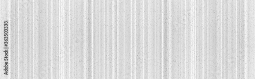 Panorama of Modern white stone wall with stripes texture and seamless background