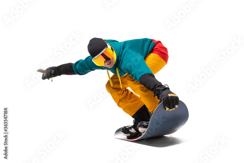Portrait young man snowboarder jump on snowboard in sportswear isolated white background
