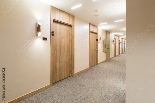 Interior of a long hotel corridor doorway