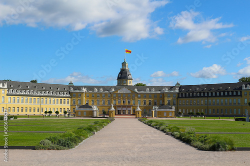 Karlsruhe Palace built by Margrave Charles III William of Baden-Durlach in 1715 under blue skies (Karlsuhe, Germany)