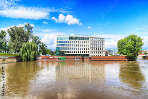 WROCLAW, POLAND - JUNE 23, 2020: Concordia Hub on Slodowa Island in Wroclaw. The combination of a modern block and historical nineteenth-century tenement house. Wroclaw Old Town, Poland, Europe.