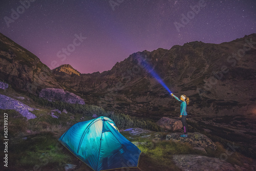 Sunset in High Tatras mountains national park. Mountain in Slovakia. Image contains noise due to high ISO and selective focus. Night sky. milky way at campsite, kemping