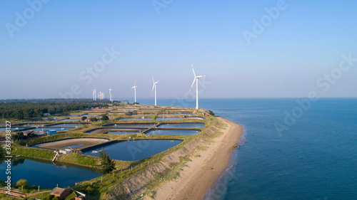 Seaside wind power generation and coastal salt and farming farms.