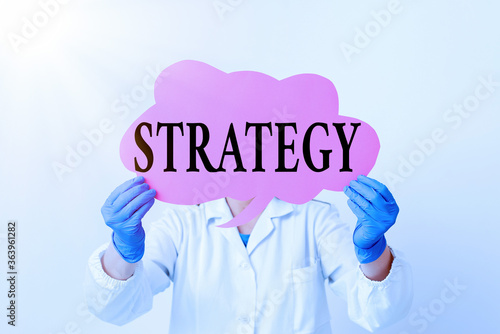 Text sign showing Strategy. Business photo text action plan or strategy designed to achieve an overall goal Laboratory technician featuring empty sticker paper accessories smartphone