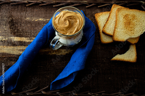  Dalgona coffee in glass cup with blue napkin and toast