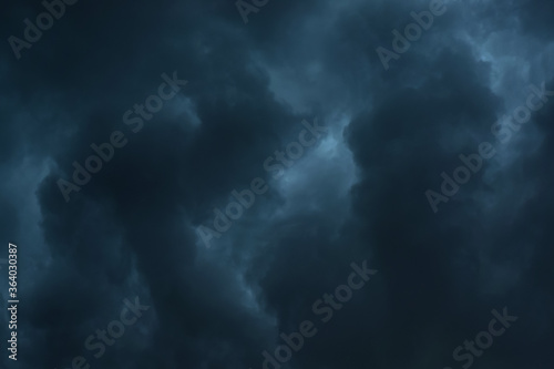Black rain storm clouds background