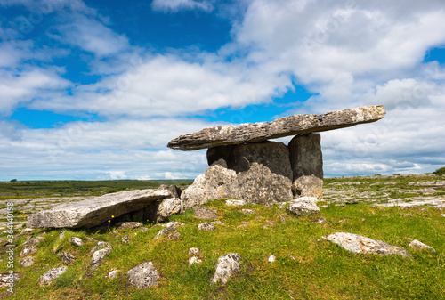 Poulnabrone dolmen is an unusually large dolmen or portal tomb located in the Burren, County Clare, Ireland. 