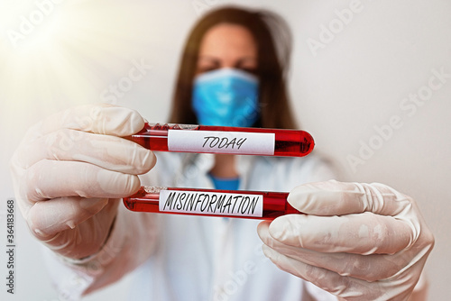 Word writing text Misinformation. Business photo showcasing false data, in particular, intended intentionally to deceive Laboratory blood test sample shown for medical diagnostic analysis result