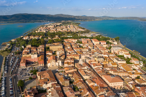 Aerial view of the seaside town of Orbetello on the tuscan coast in the maremma eastern lagoon and western lagoon
