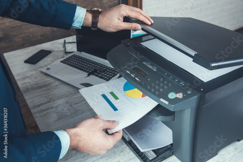 man hand paper and printer