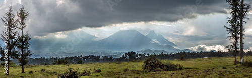 Three volcanoes seen from Rwanda in the border area with the Democratic Republic of Congo: mounts Karisimbi, Bisoke & Mikeno (from left to right).