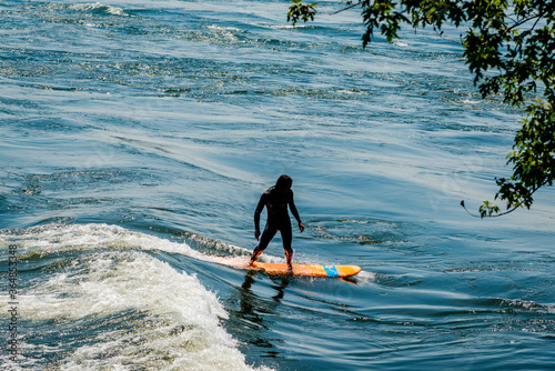 Surfing the St. Lawrence River in Montréal - Québec, Canada