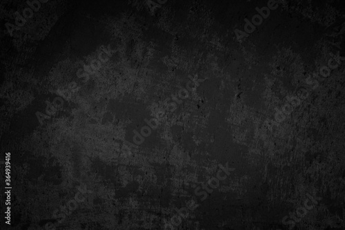 Art black concrete stone texture for background in black. Abstract color dry scratched surface wall cover colorful paper scratches shabby vintage Cement and sand grey dark detail covering.