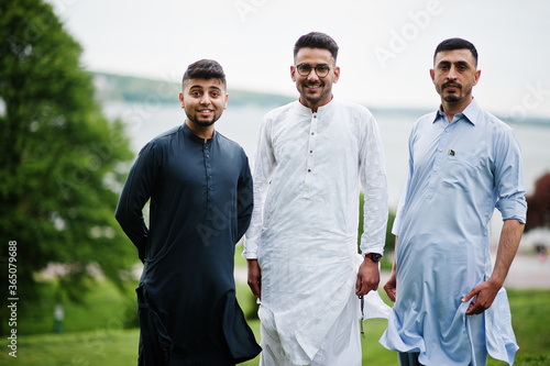 Group of pakistani man wearing traditional clothes salwar kameez or kurta.