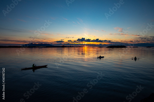 Kayaking in Midnight Sun on Helgeland in Northern Norway