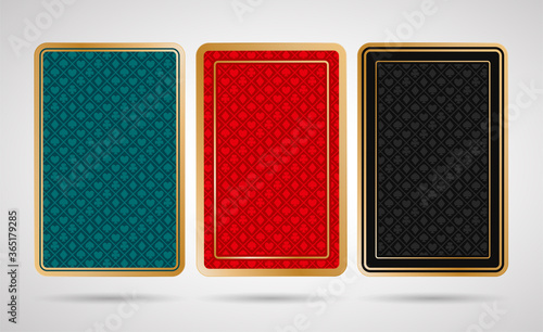 Three poker playing cards back side design - black, turquoise, red and golden colored