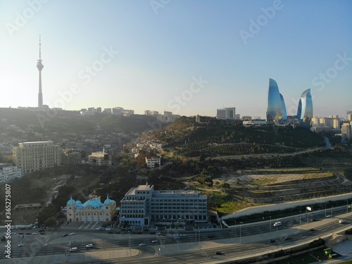 Amazing aerial view from above by drone on capital of Azerbaijan - Baku. Tele tower and Flame towers