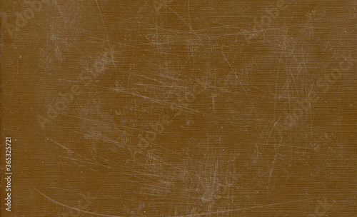 photo texture of an old scratched brown surface