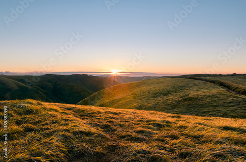 Beautiful scenery of mountain valley during sunrise