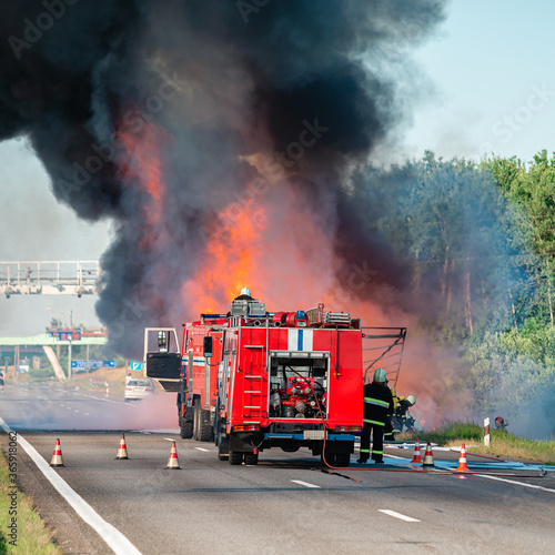 accident and fire on the road vertically