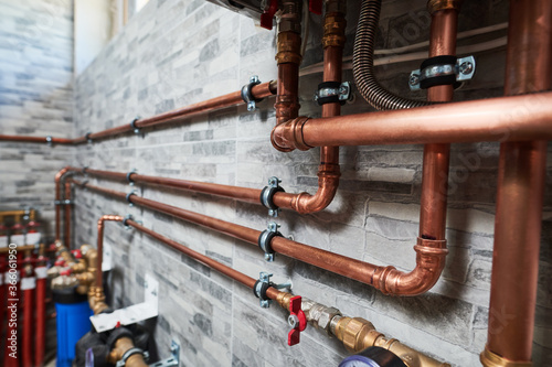 Plumbing service. copper pipeline of a heating system in boiler room