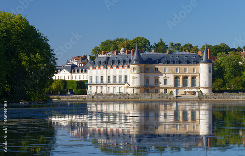 View of Rambouillet castle , XIV century, in picturesque Public Park in town of Rambouillet , 50 km southwest of Paris. France.