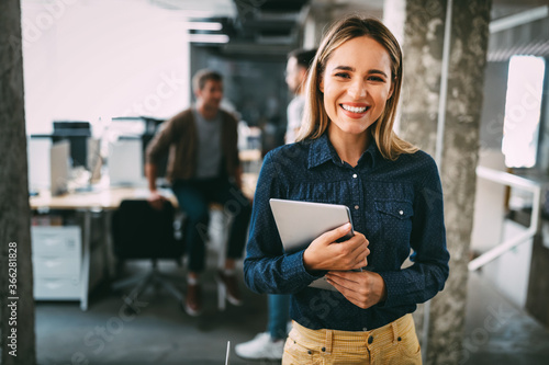 Successful company with happy employees in modern office