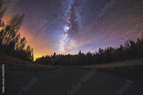 Milky Way in the night sky with a shooting star in Flagstaff, Arizona
