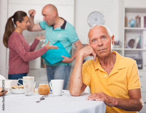 Home quarrel between father and adult children. High quality photo