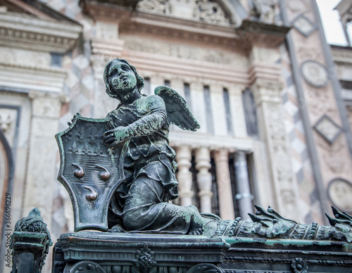 Bronze sculpture in the old square in front of the Duomo in Bergamo. Lombardy, Italy